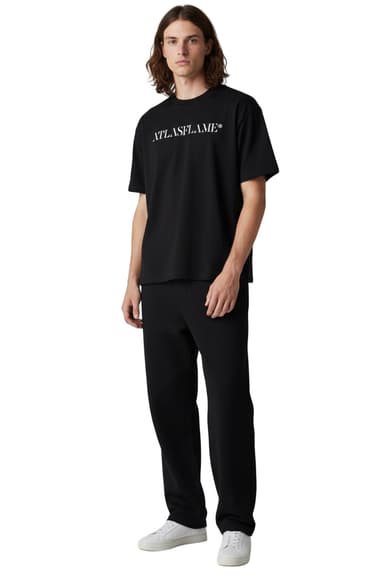 Model wearing the ATLASFLAME 280gsm T-shirt in a minimal, boxy fit