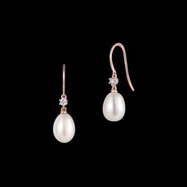 Dangling balloon pearl earrings